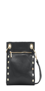 Crafted with buttery black leather Red embossed suede lining Brushed gold hardware, guaranteed for life Cell phone pocket on outside Credit card slot inside 9.5"L x 2"W x 9.5"H, Straps: 1" W x 52" Ln