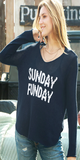 This relaxed fit, yet shaped top features our flattering curved shirt tail hems and side slits. Light, soft, ropey cotton with an airy, loose construction keeps you comfortable as the seasons change. The words "Sunday Funday" are knit directly into the center front.  The tunic length makes this versatile top perfect to pair over anything from leggings to dresses.  Composition: 60% cotton, 40% acrylic This style runs true to size. MACHINE WASHABLE Color: Blue