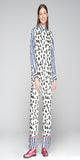 Fluid shirt with animal print on the front, blue and white striped sleeves and floral check back. Front fastening with shirt buttons. Long sleeves with cuffs.&nbsp;

52% Viscose 48% Rayon